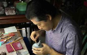 史菊明